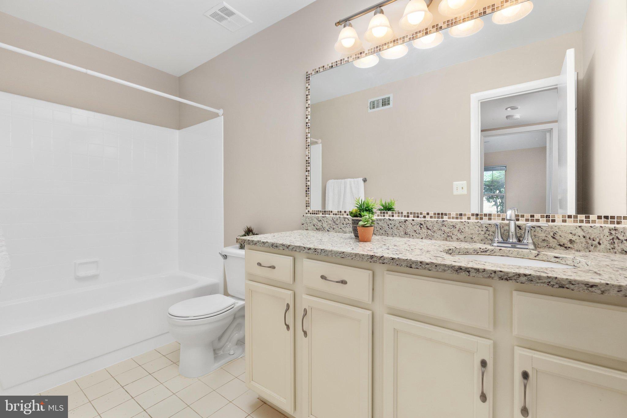 1706 A Ascot Way Reston, VA 20190 - Photo 16 of 23 Secondary bath with tub/shower combo
