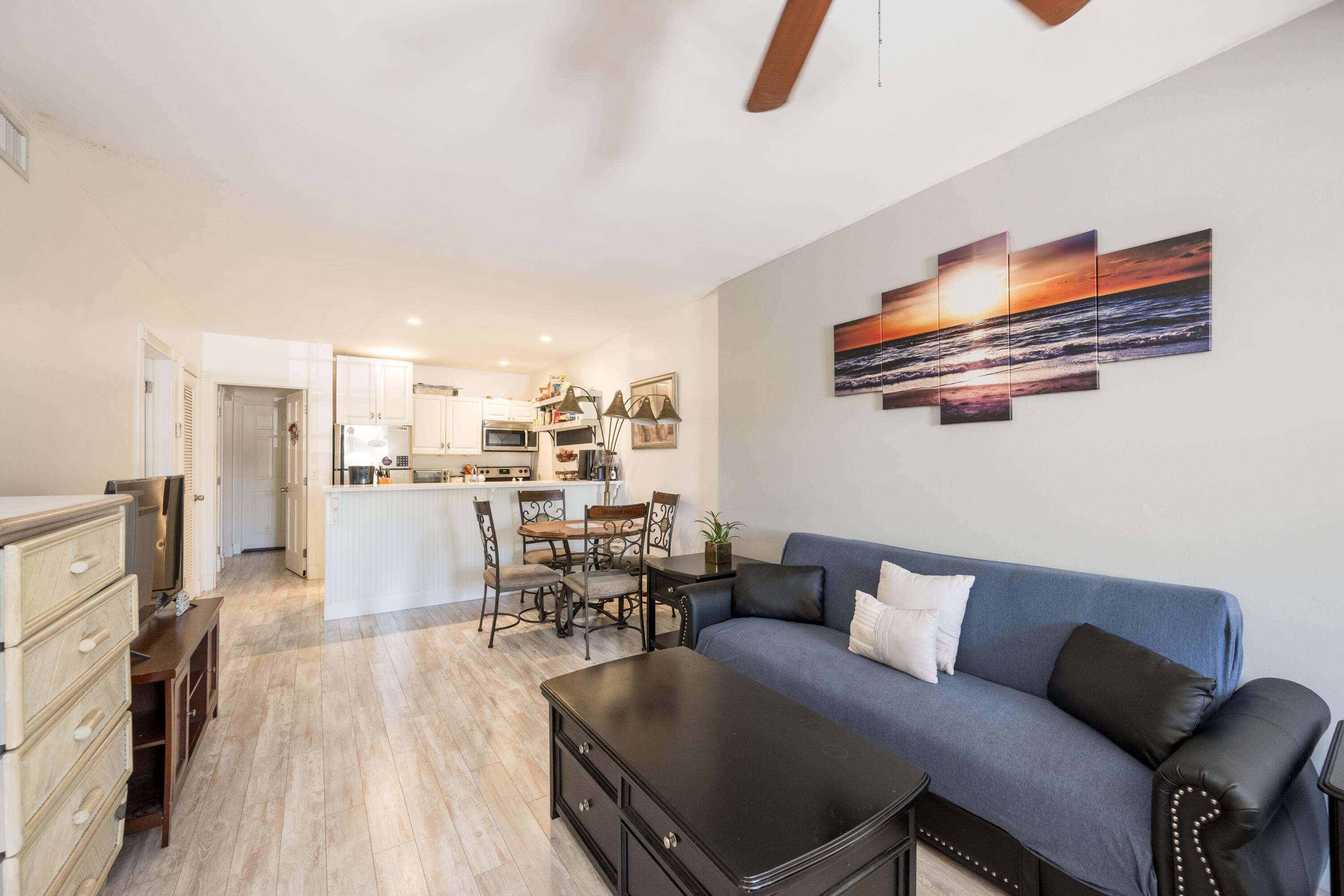 1207 William Street, Unit 3 Key West, FL 33040 - Photo 2 of 20 a living room with furniture and a wooden floor