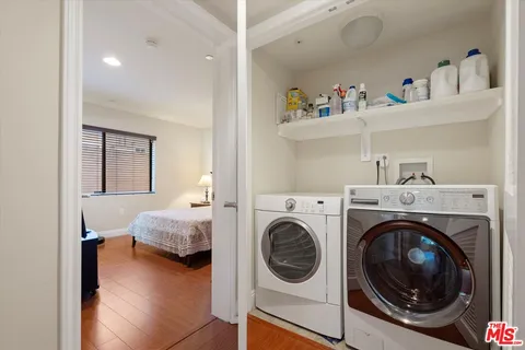 a view of parking garage with cars