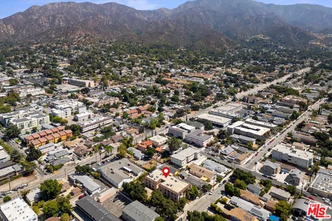 a view of a street in front of a building
