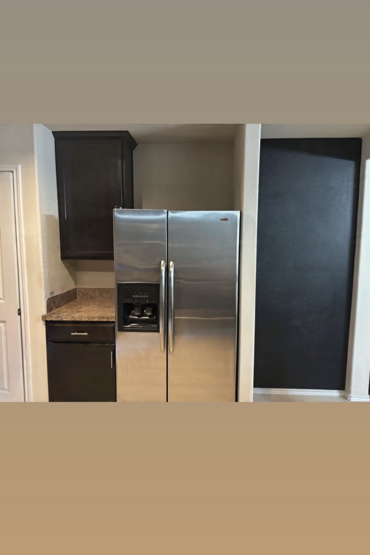 9534 Brandon Rock Lane Houston, TX 77044 - Photo 6 of 7 a kitchen with a refrigerator and a stove