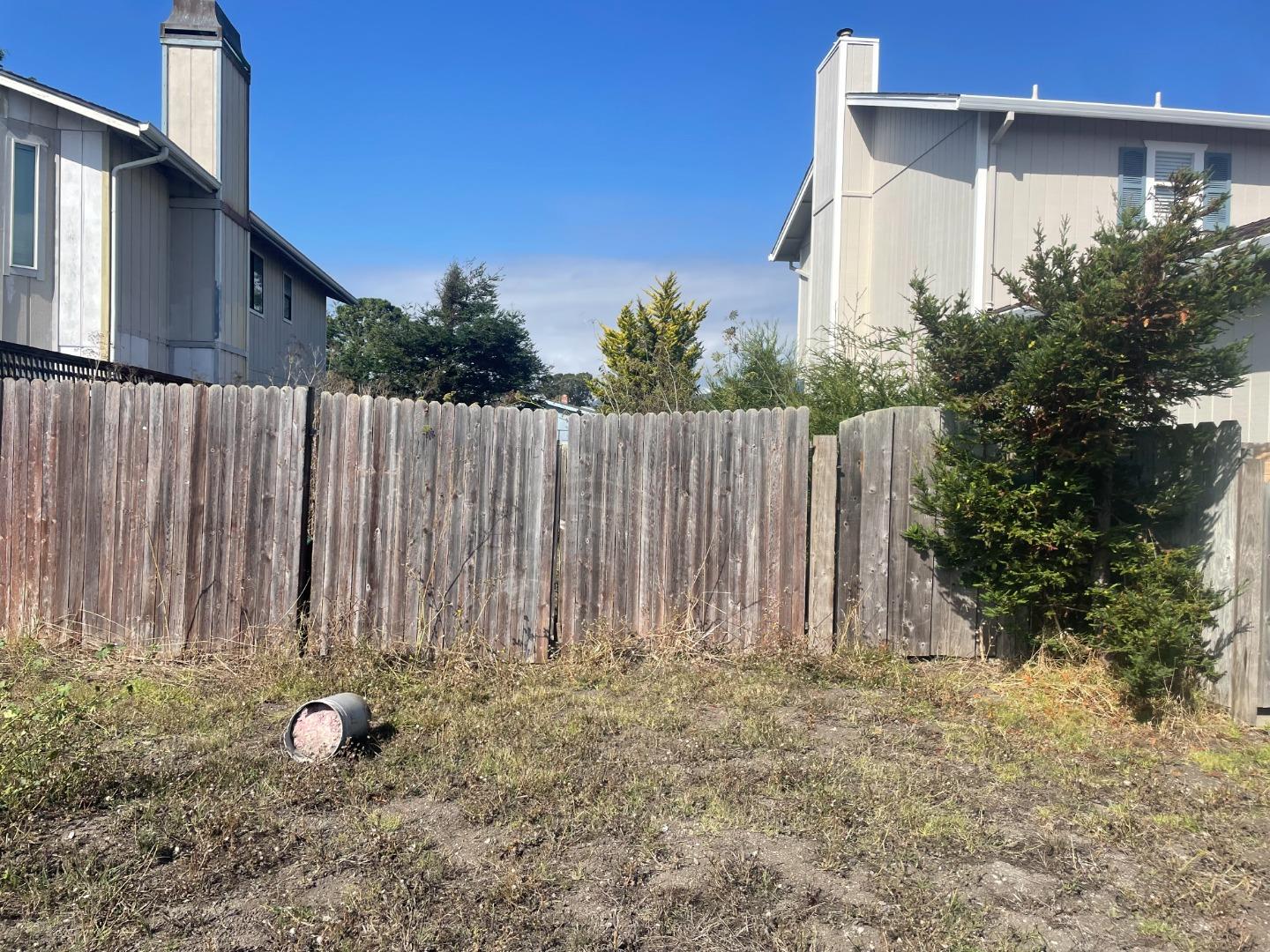 a view of a wooden fence