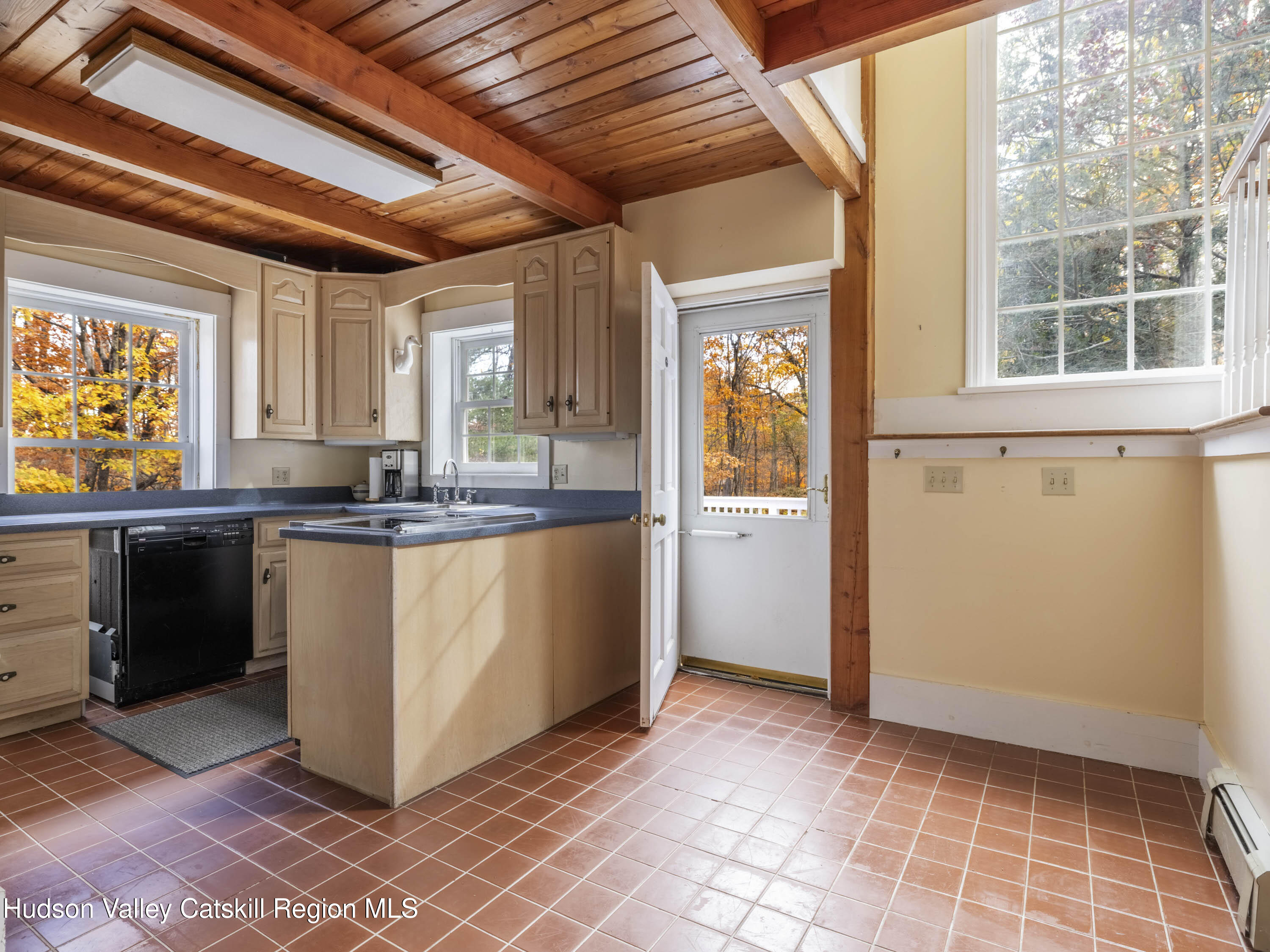 216 Starbarrack Road Red Hook, NY 12571 - Photo 14 of 45 a kitchen with granite countertop a sink a counter top space and cabinets