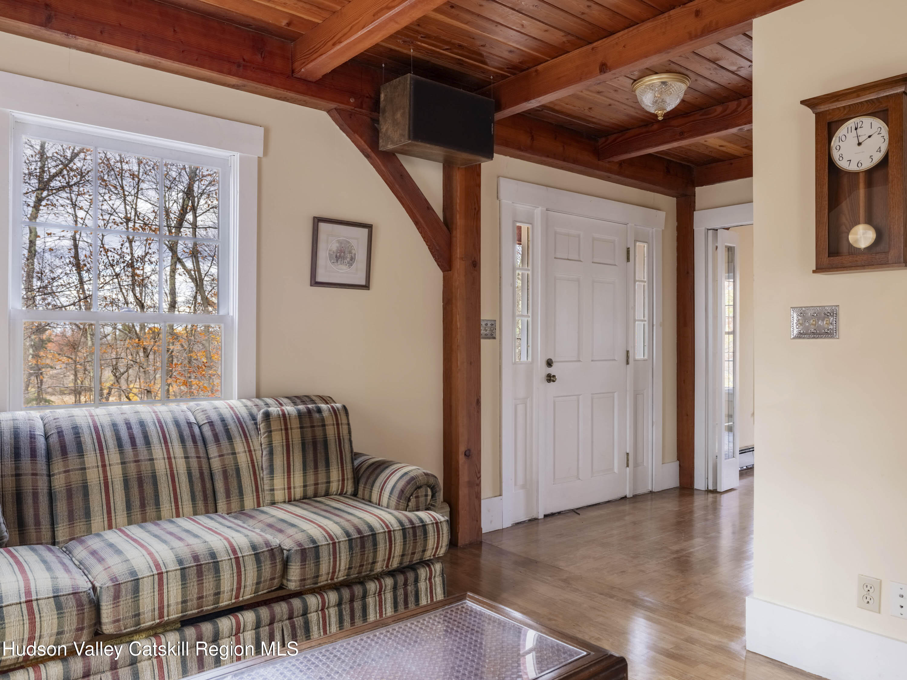 216 Starbarrack Road Red Hook, NY 12571 - Photo 8 of 45 a bedroom with a bed and wooden floor