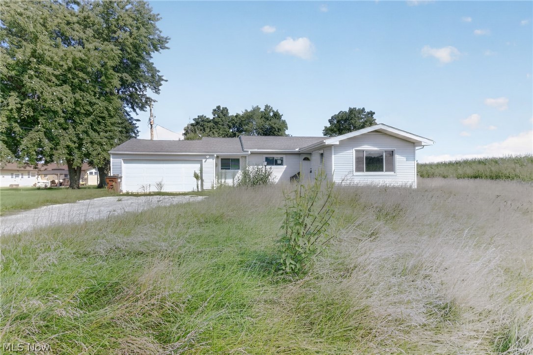 8240 Spencerville Road Spencerville, OH 45887 - Photo 3 of 11 Attached garage and plenty of space to enjoy!