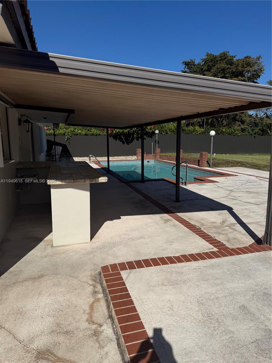 2431 Southwest 124th Avenue Miami, FL 33175 - Photo 2 of 20 a view of entryway and hall with wooden floor