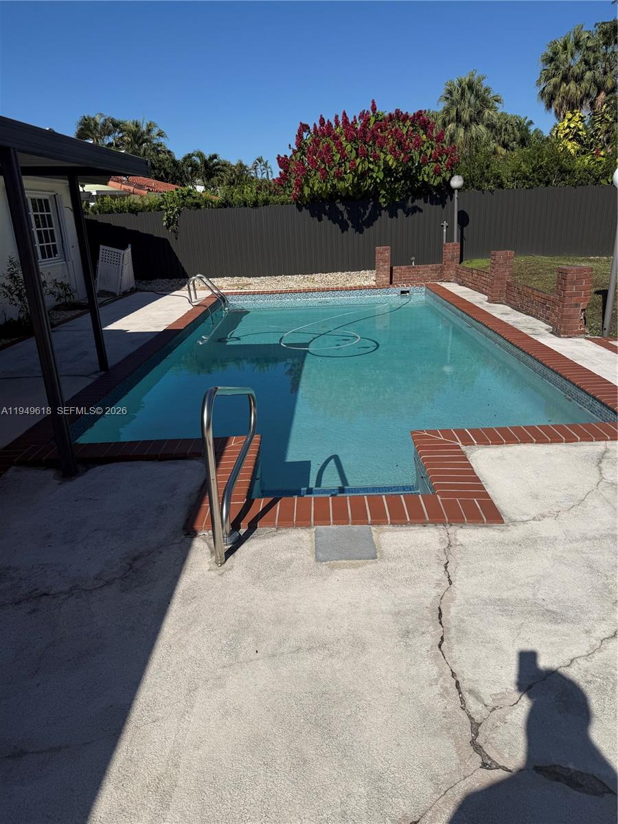 2431 Southwest 124th Avenue Miami, FL 33175 - Photo 4 of 20 a view of a backyard with seating area