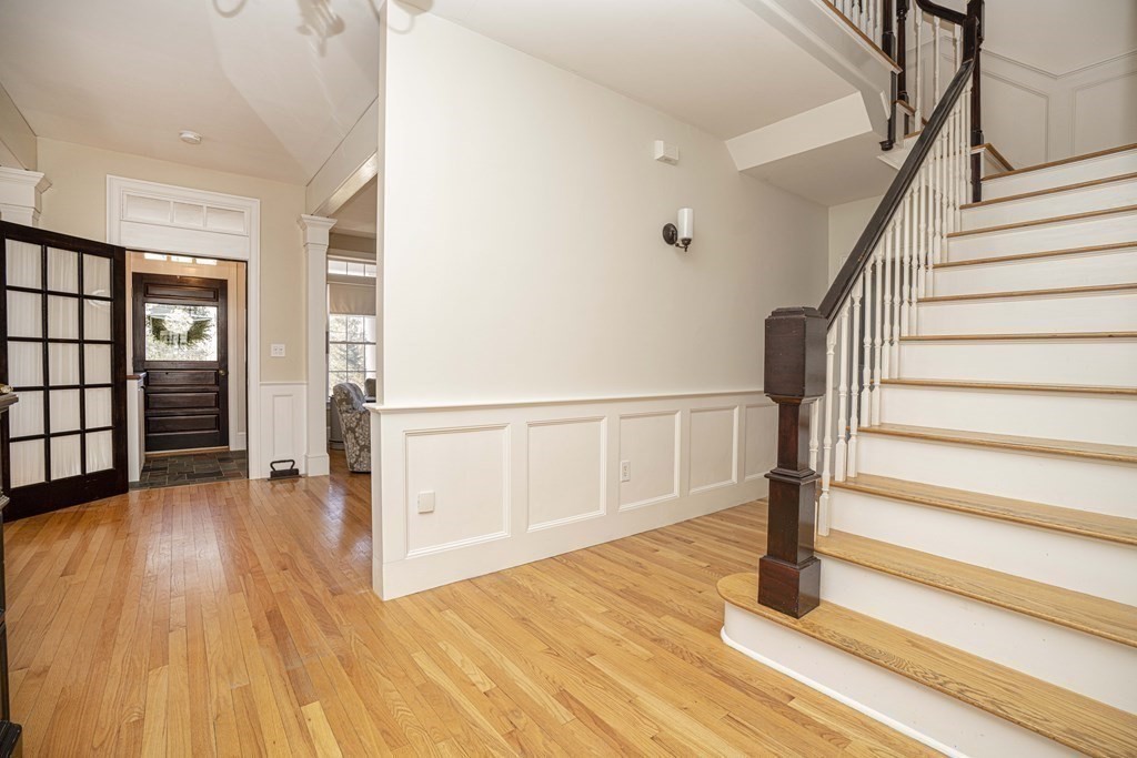 744 Berkley Street Berkley, MA 02779 - Photo 13 of 41 a view of entryway with wooden floor and stairs