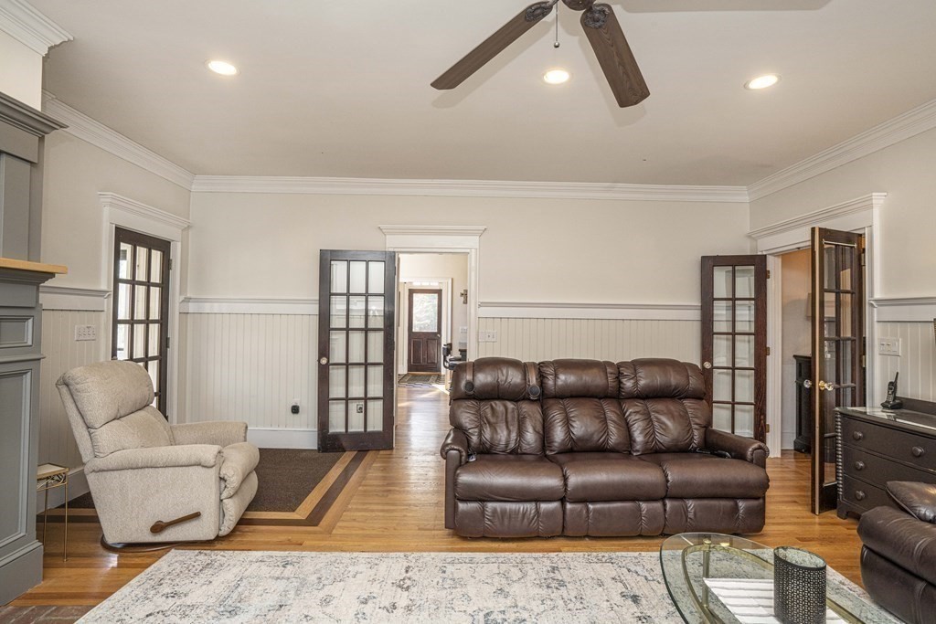 744 Berkley Street Berkley, MA 02779 - Photo 16 of 41 a living room with furniture and a rug