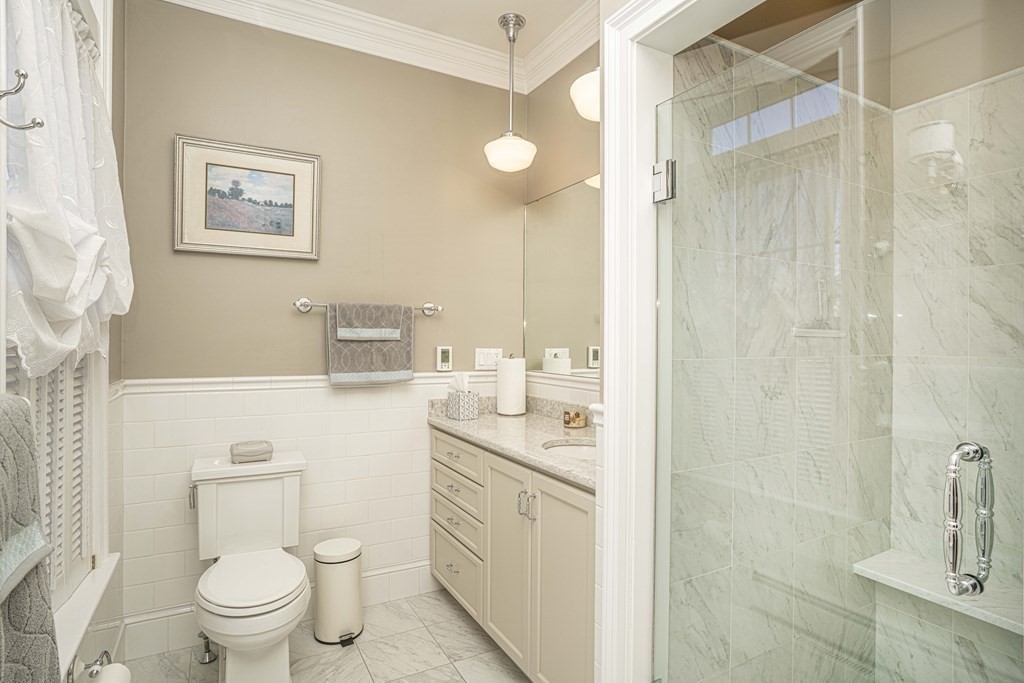 744 Berkley Street Berkley, MA 02779 - Photo 22 of 41 a bathroom with a toilet sink and mirror