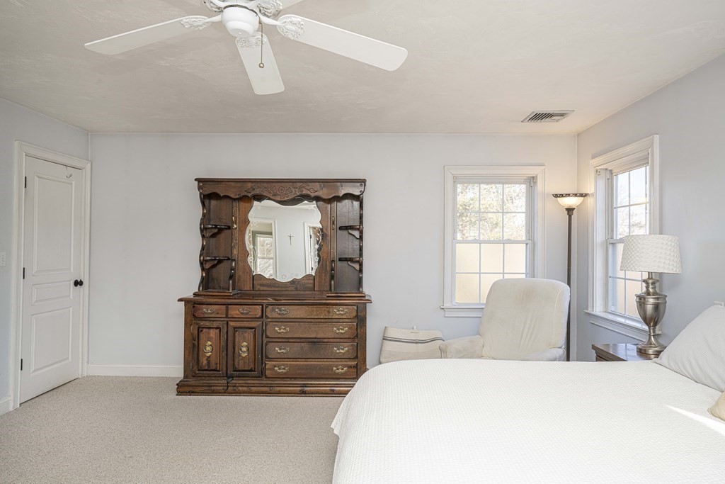 744 Berkley Street Berkley, MA 02779 - Photo 25 of 41 a bedroom with a bed and window