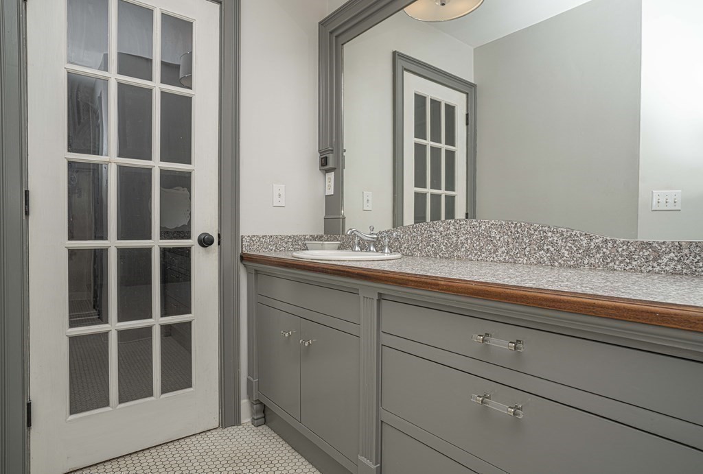 744 Berkley Street Berkley, MA 02779 - Photo 29 of 41 a bathroom with a sink and a mirror