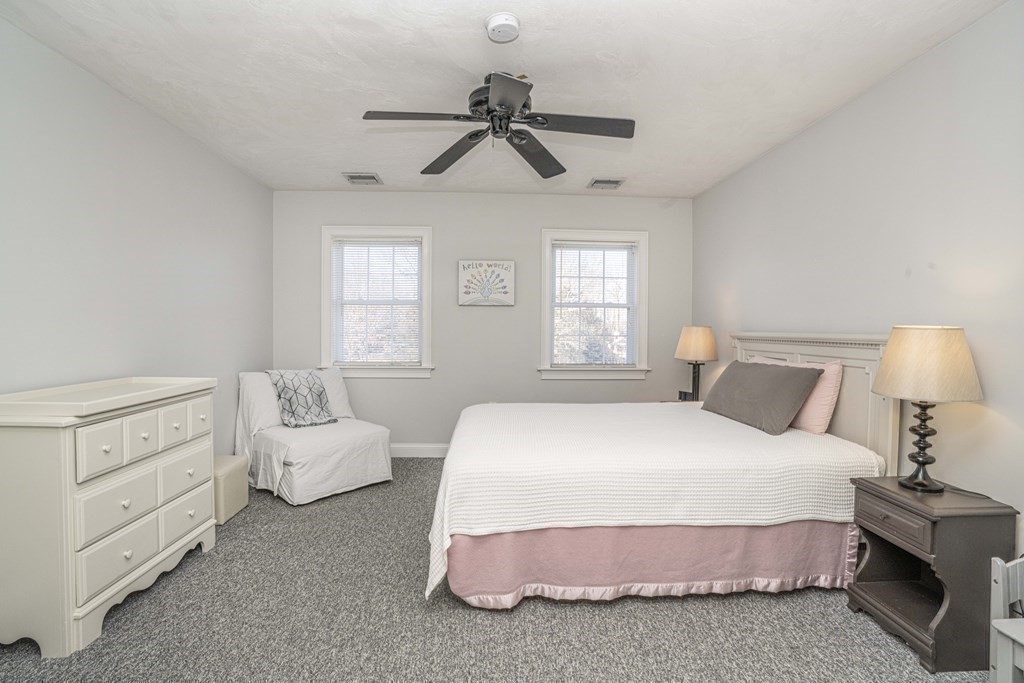 744 Berkley Street Berkley, MA 02779 - Photo 30 of 41 a bedroom with a bed and window