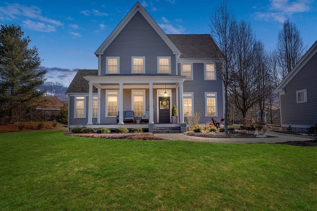 744 Berkley Street Berkley, MA 02779 - Photo 3 of 41 a front view of a house with patio and garden