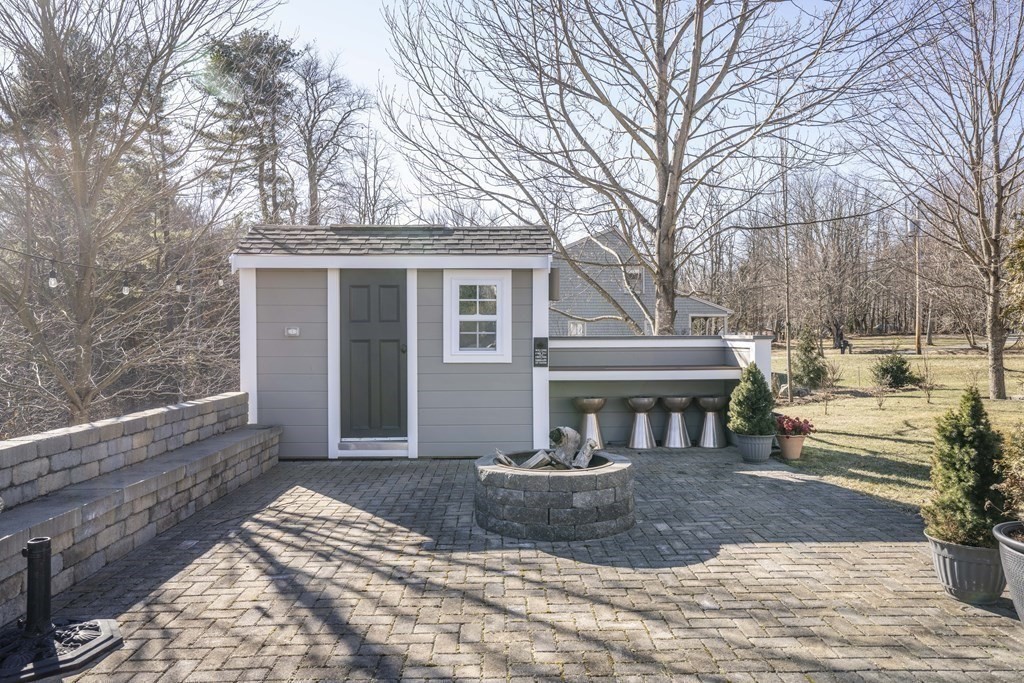 744 Berkley Street Berkley, MA 02779 - Photo 36 of 41 a view of a house with a yard covered in snow