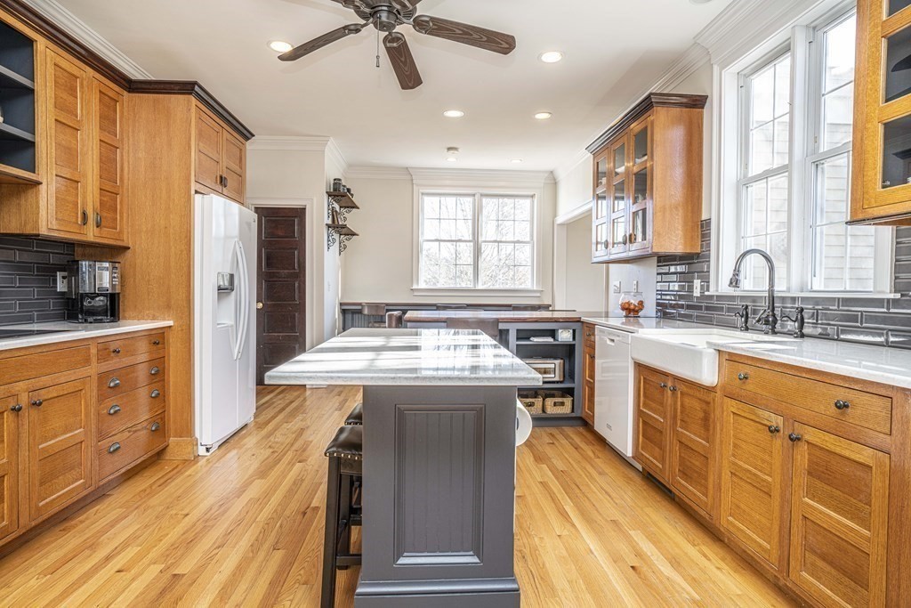 744 Berkley Street Berkley, MA 02779 - Photo 5 of 41 a kitchen with stainless steel appliances granite countertop a sink stove and refrigerator