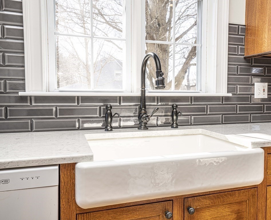 744 Berkley Street Berkley, MA 02779 - Photo 10 of 41 a view of a sink and a large window