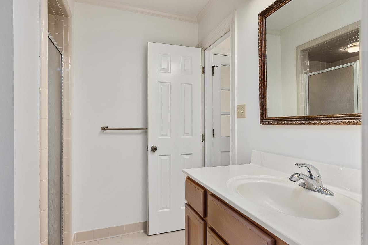 8724 Fort Macon Court Raleigh, NC 27615 - Photo 15 of 30 Main level ensuite