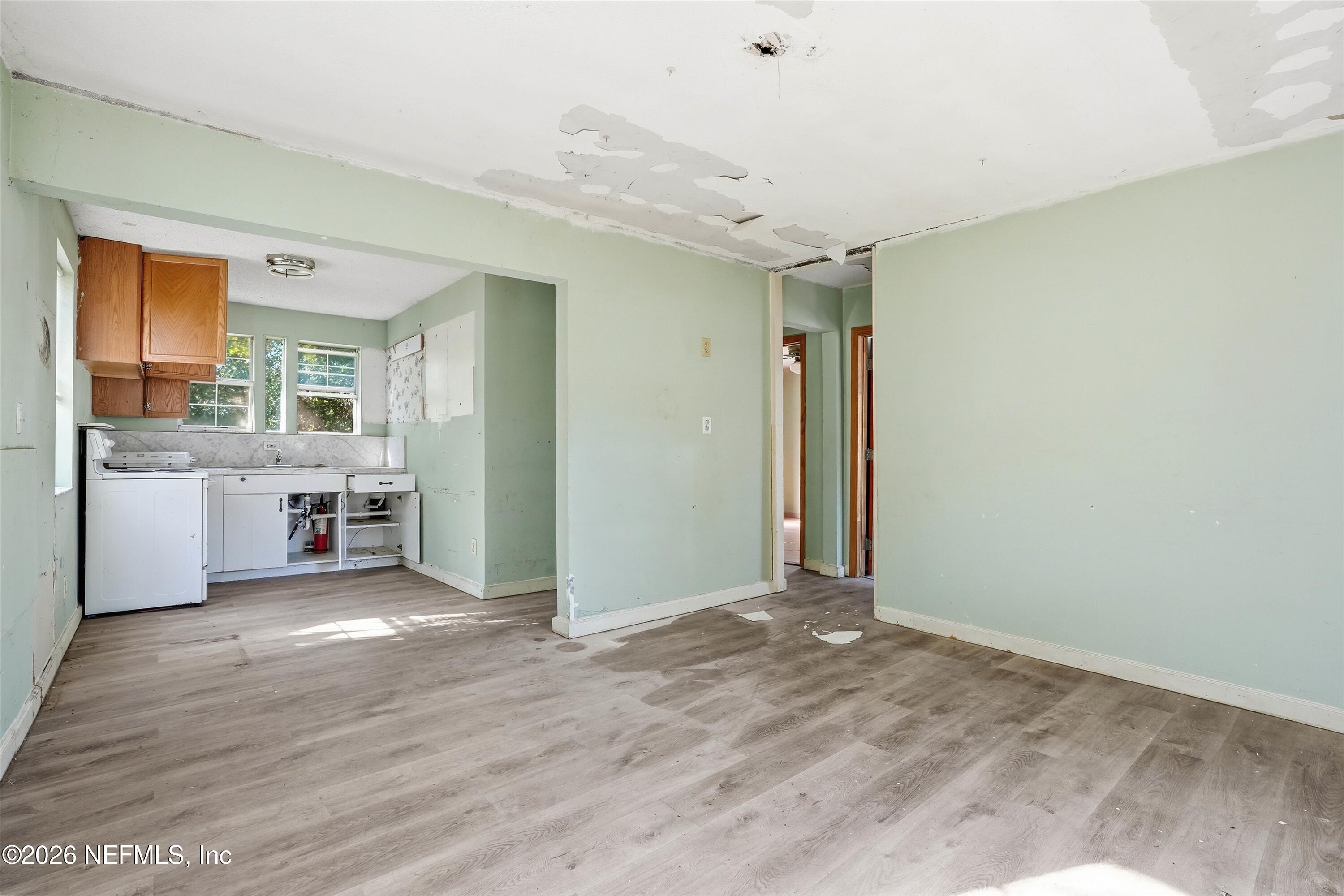 27 Julia Street St. Augustine, FL 32084 - Photo 17 of 46 a view of a kitchen with a sink and a window