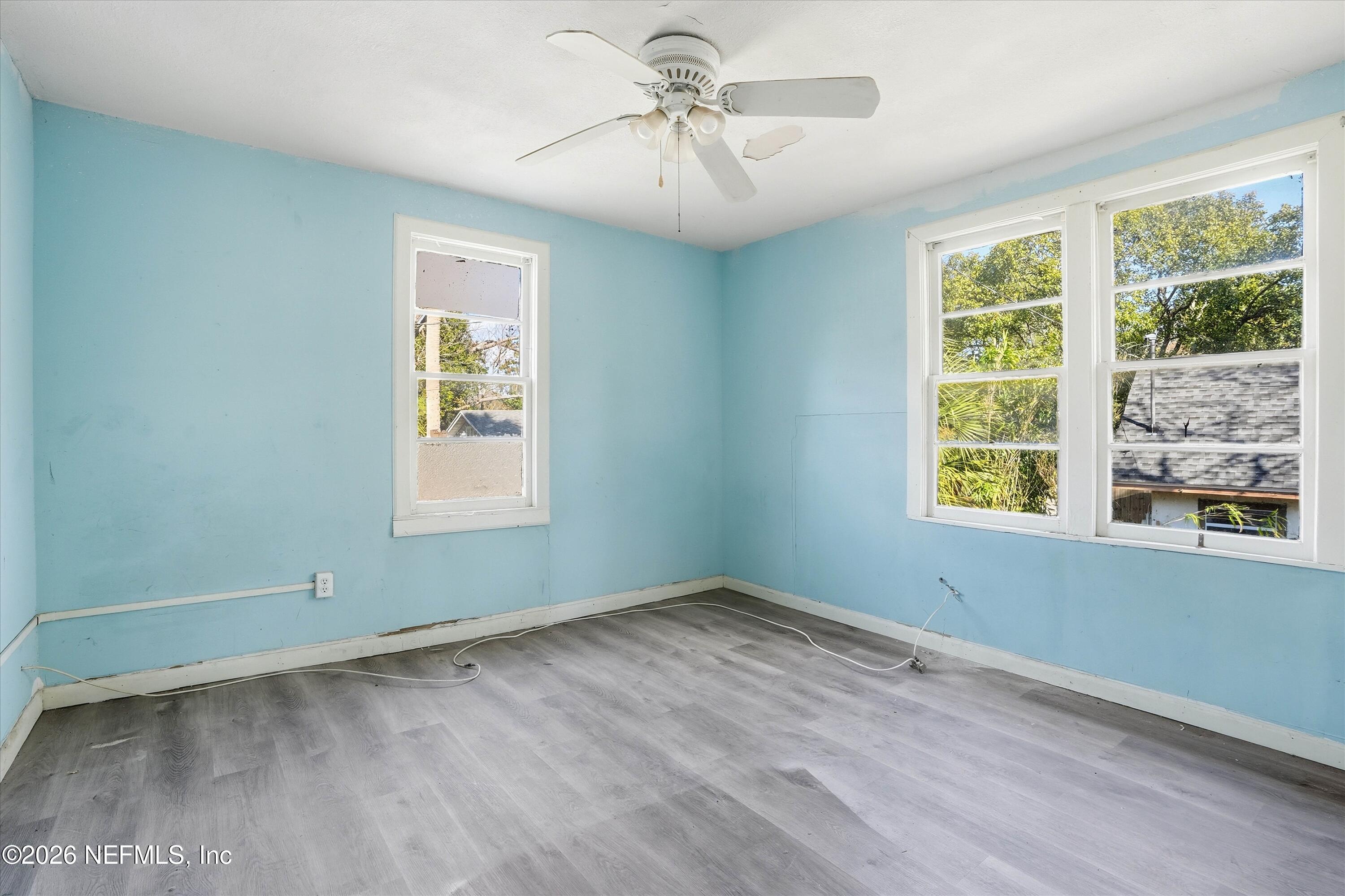 27 Julia Street St. Augustine, FL 32084 - Photo 21 of 46 a view of wooden floor and windows in a room