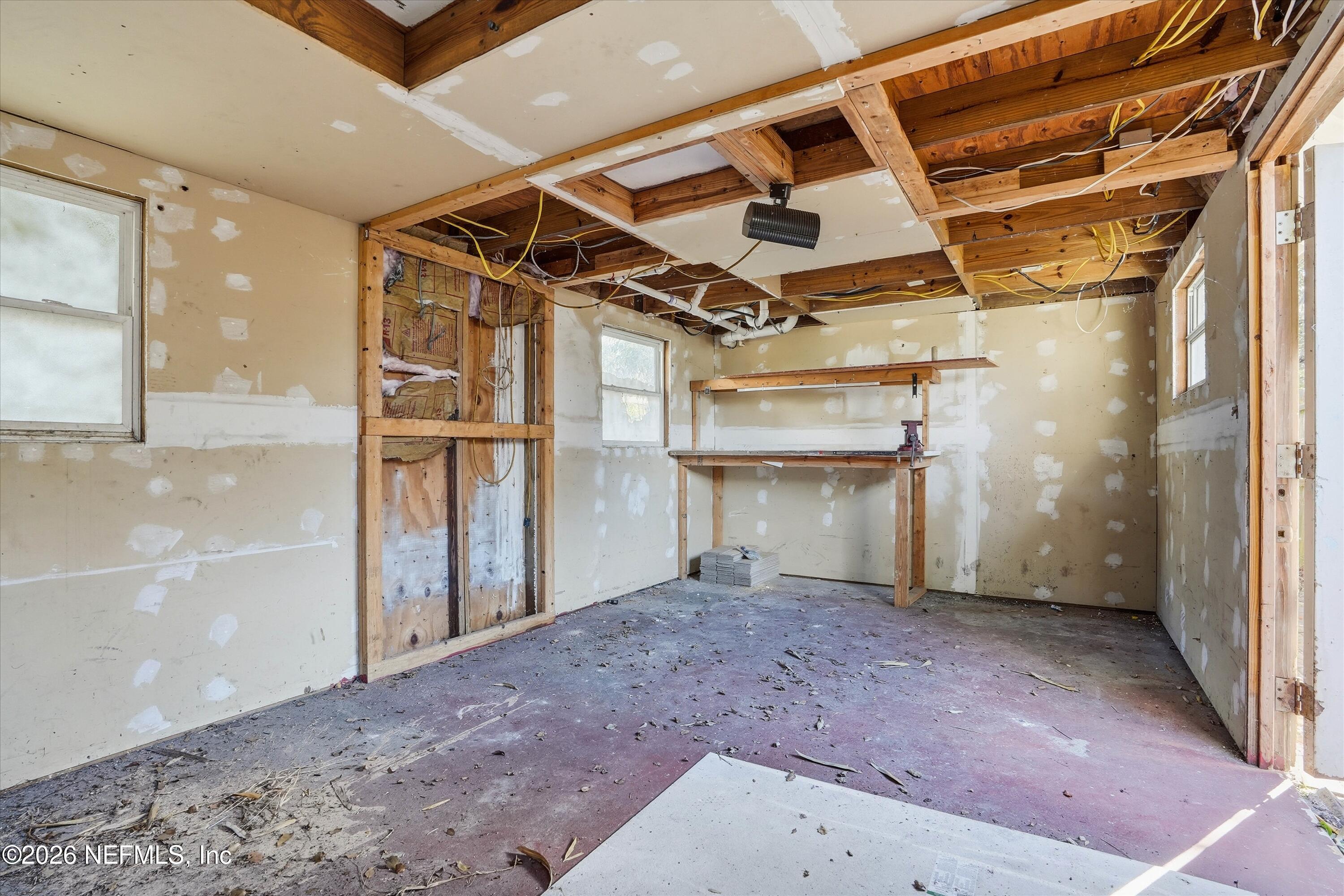 27 Julia Street St. Augustine, FL 32084 - Photo 25 of 46 a view of empty room with wooden floor