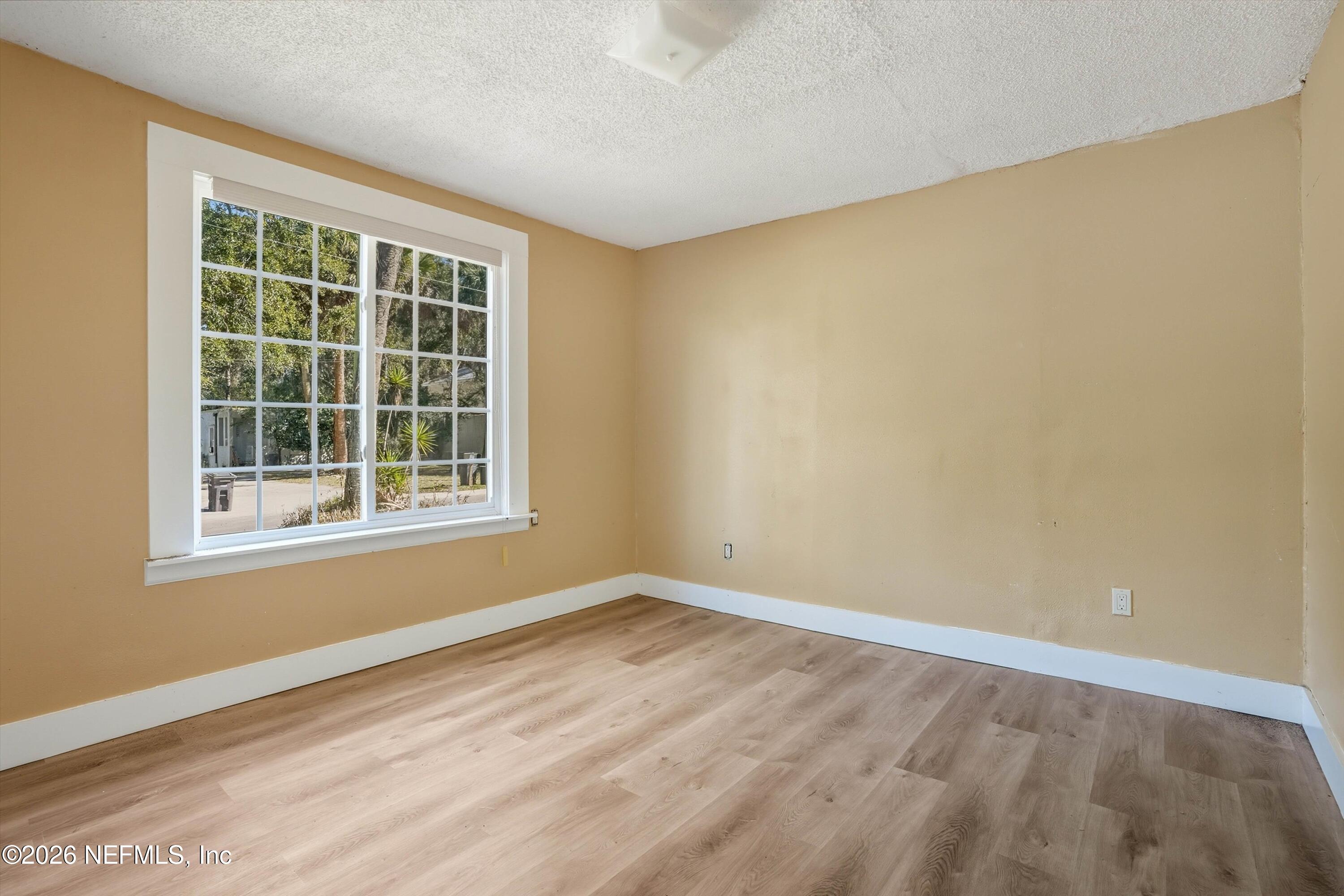 27 Julia Street St. Augustine, FL 32084 - Photo 37 of 46 an empty room with a window