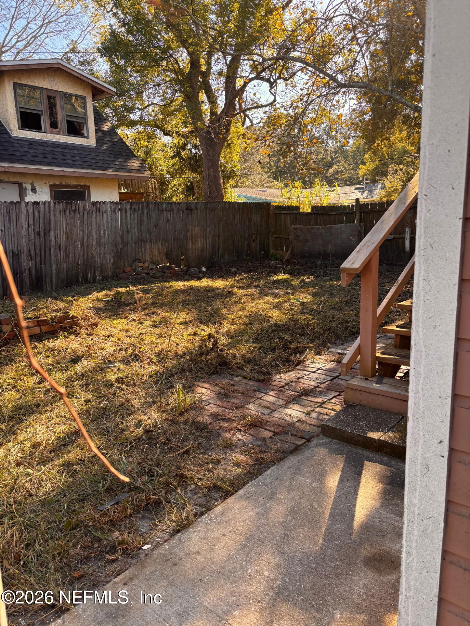 27 Julia Street St. Augustine, FL 32084 - Photo 6 of 46 a backyard of a house