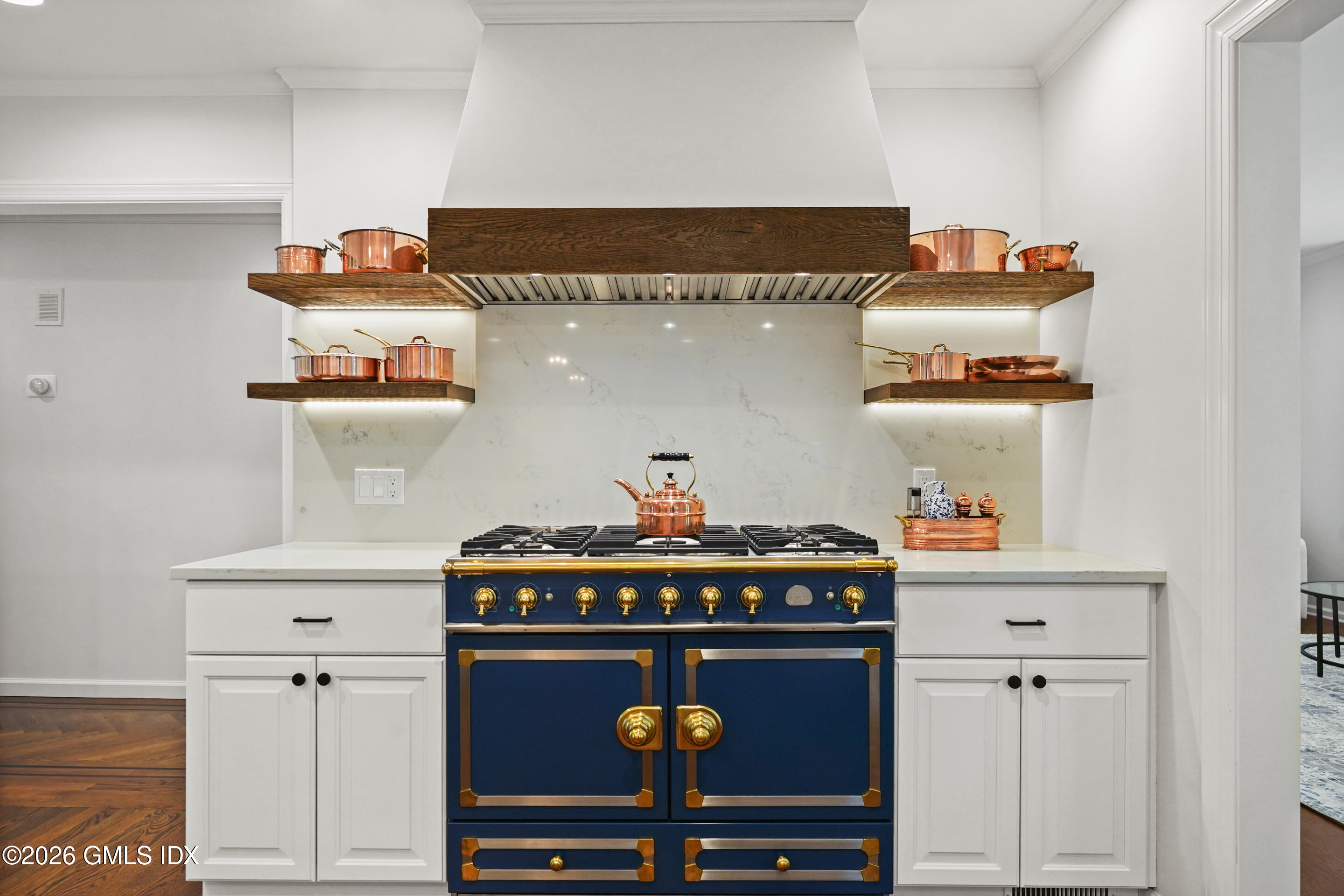 118 Butternut Hollow Road Greenwich, CT 06830 - Photo 11 of 44 a kitchen with a stove and a cabinets