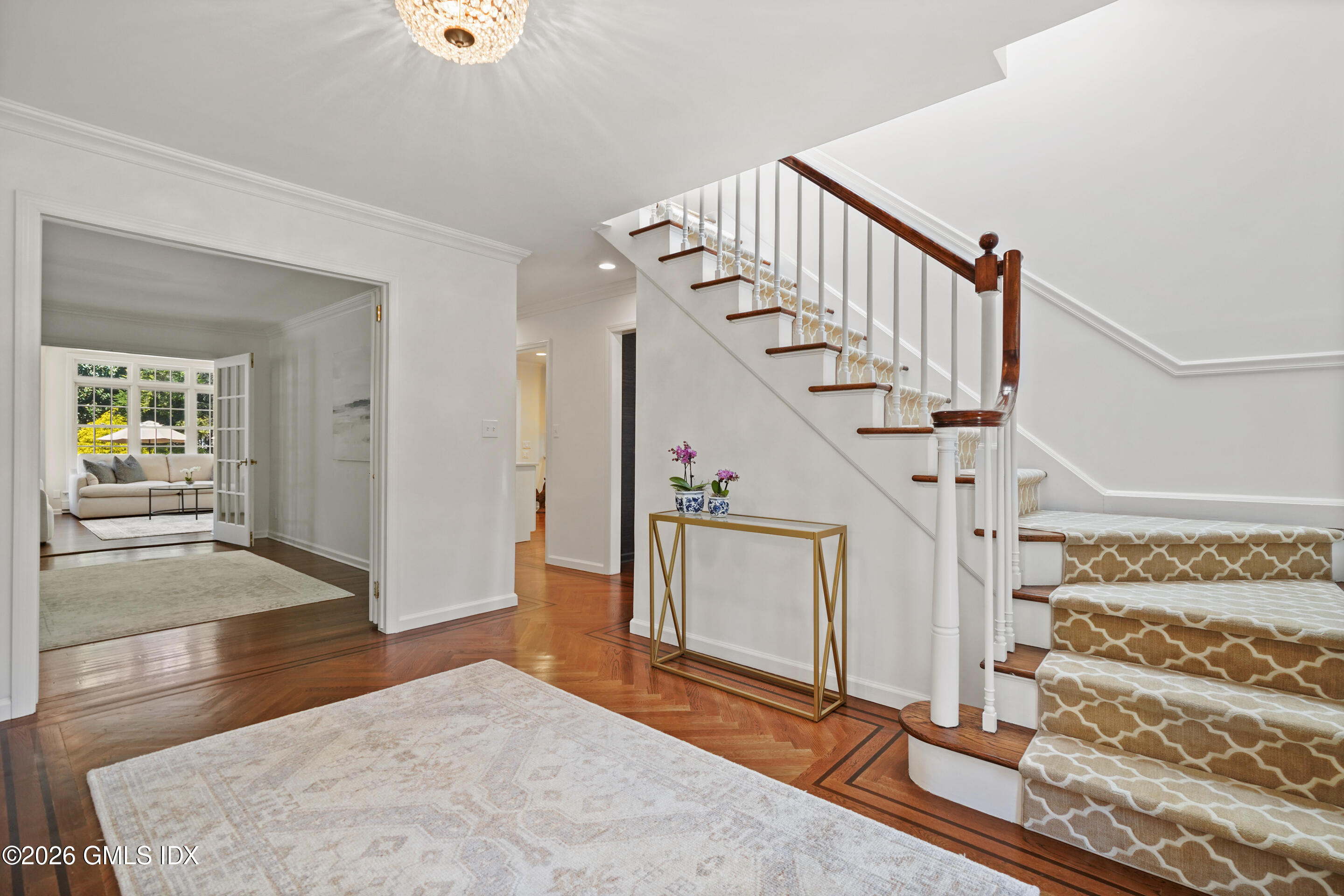 118 Butternut Hollow Road Greenwich, CT 06830 - Photo 19 of 44 a view of entryway and hall with wooden floor