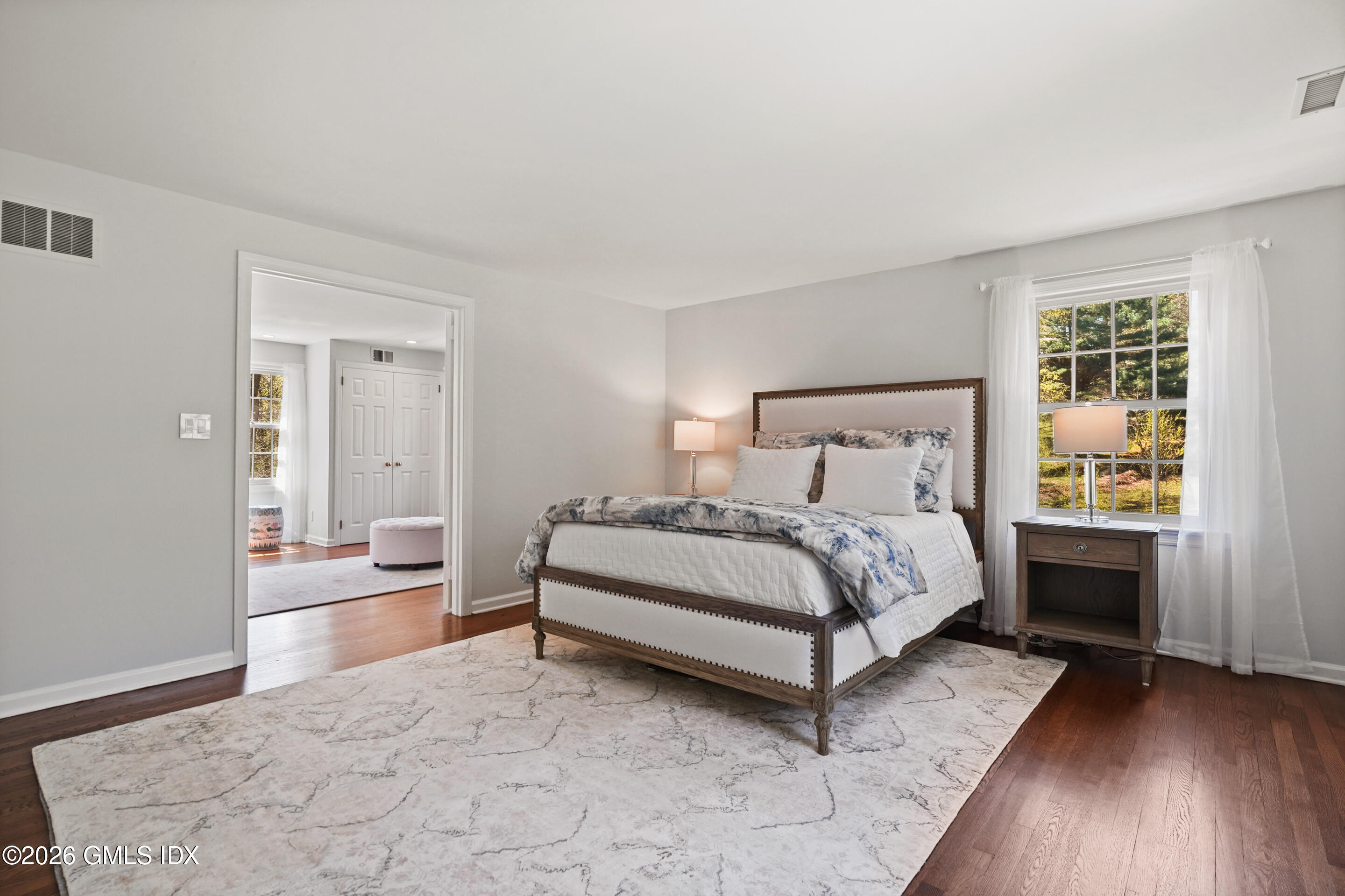 118 Butternut Hollow Road Greenwich, CT 06830 - Photo 20 of 44 a bed room with a bed and a couch
