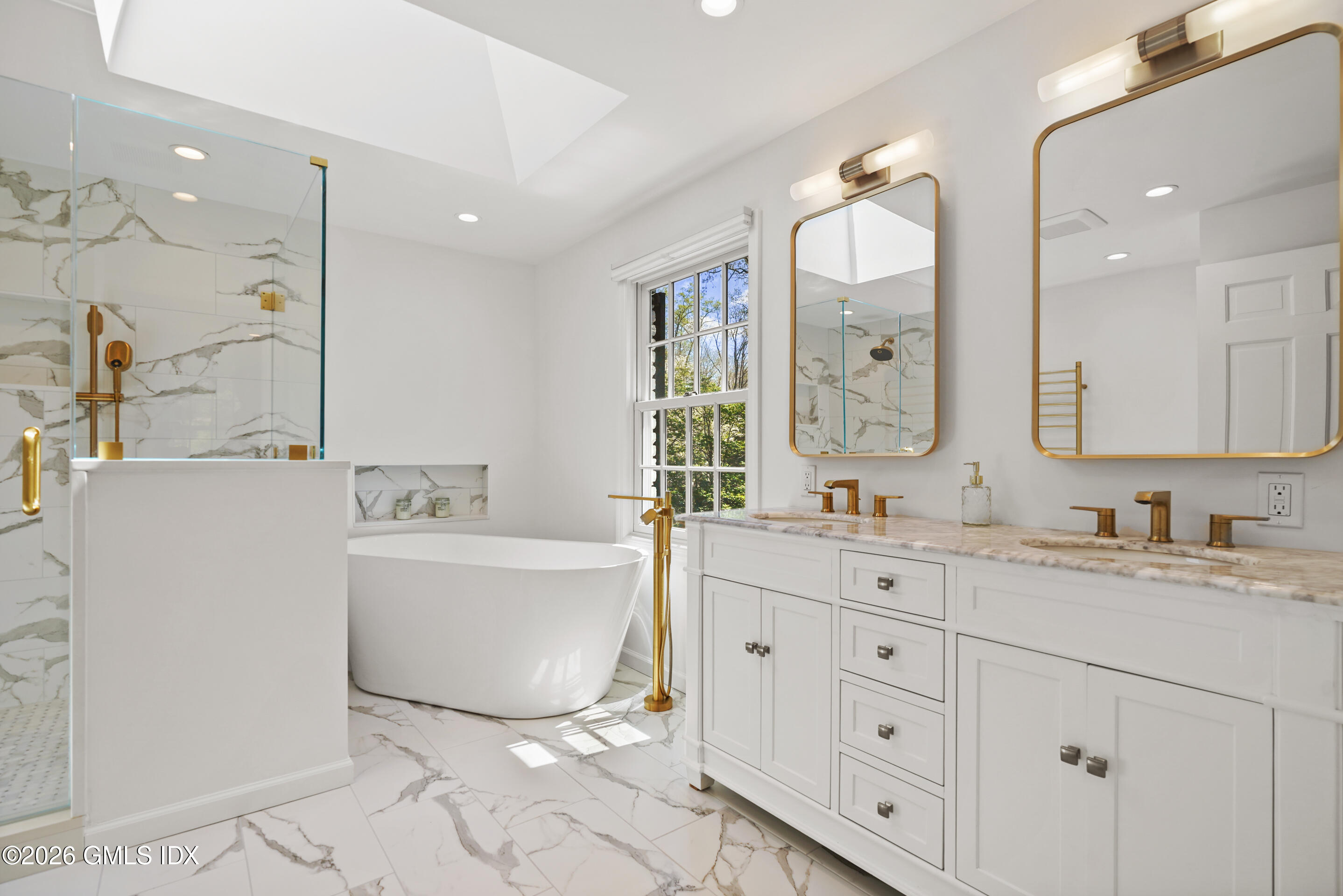 118 Butternut Hollow Road Greenwich, CT 06830 - Photo 23 of 44 a bathroom with a granite countertop sink mirror and bathtub