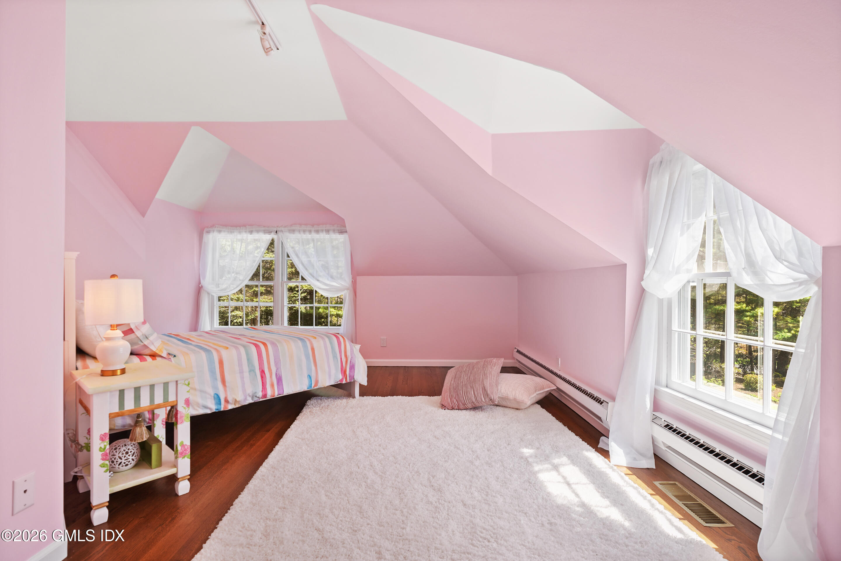 118 Butternut Hollow Road Greenwich, CT 06830 - Photo 28 of 44 a bedroom with a bed and a window