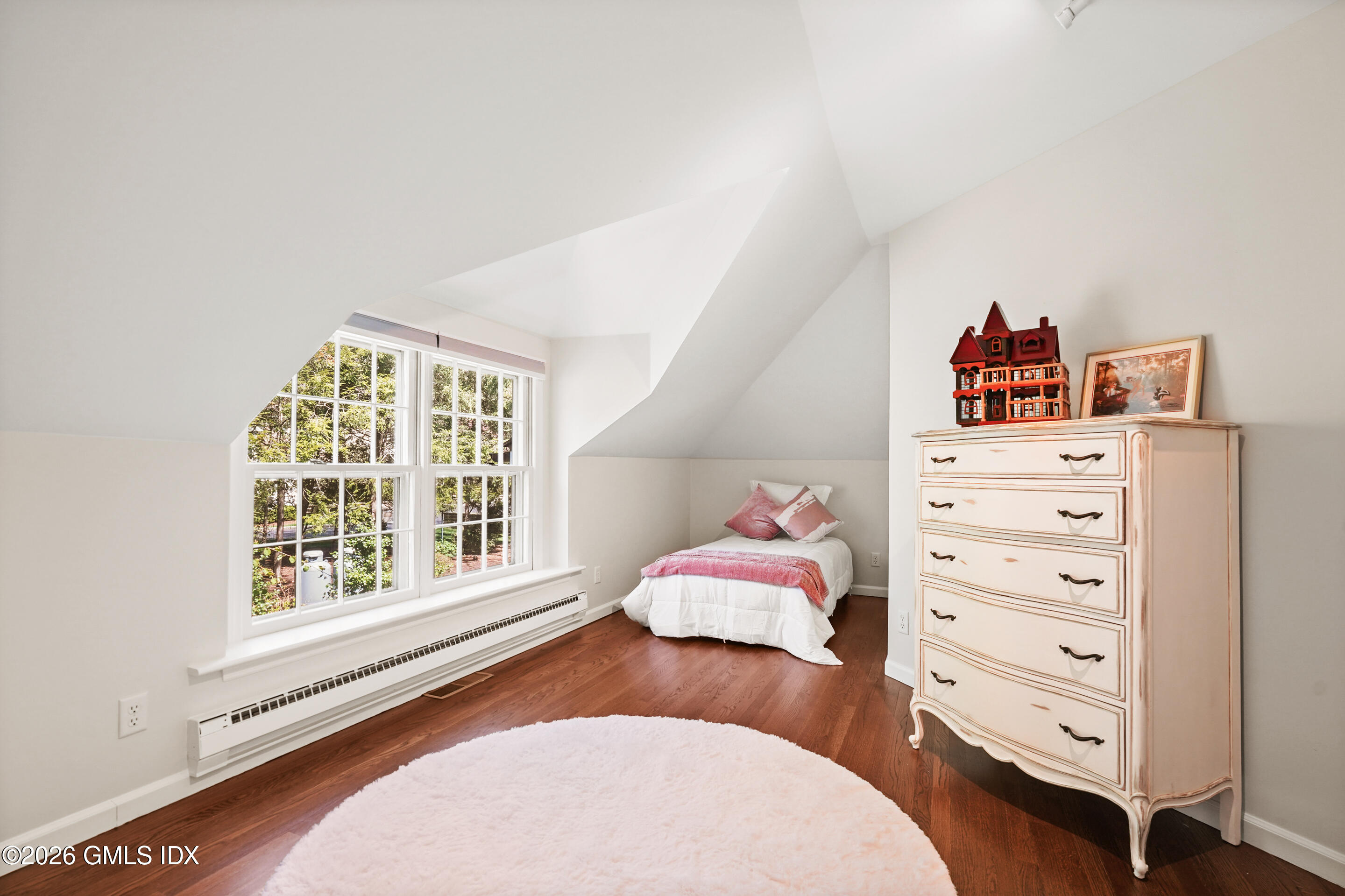 118 Butternut Hollow Road Greenwich, CT 06830 - Photo 29 of 44 a bedroom with a bed and a window