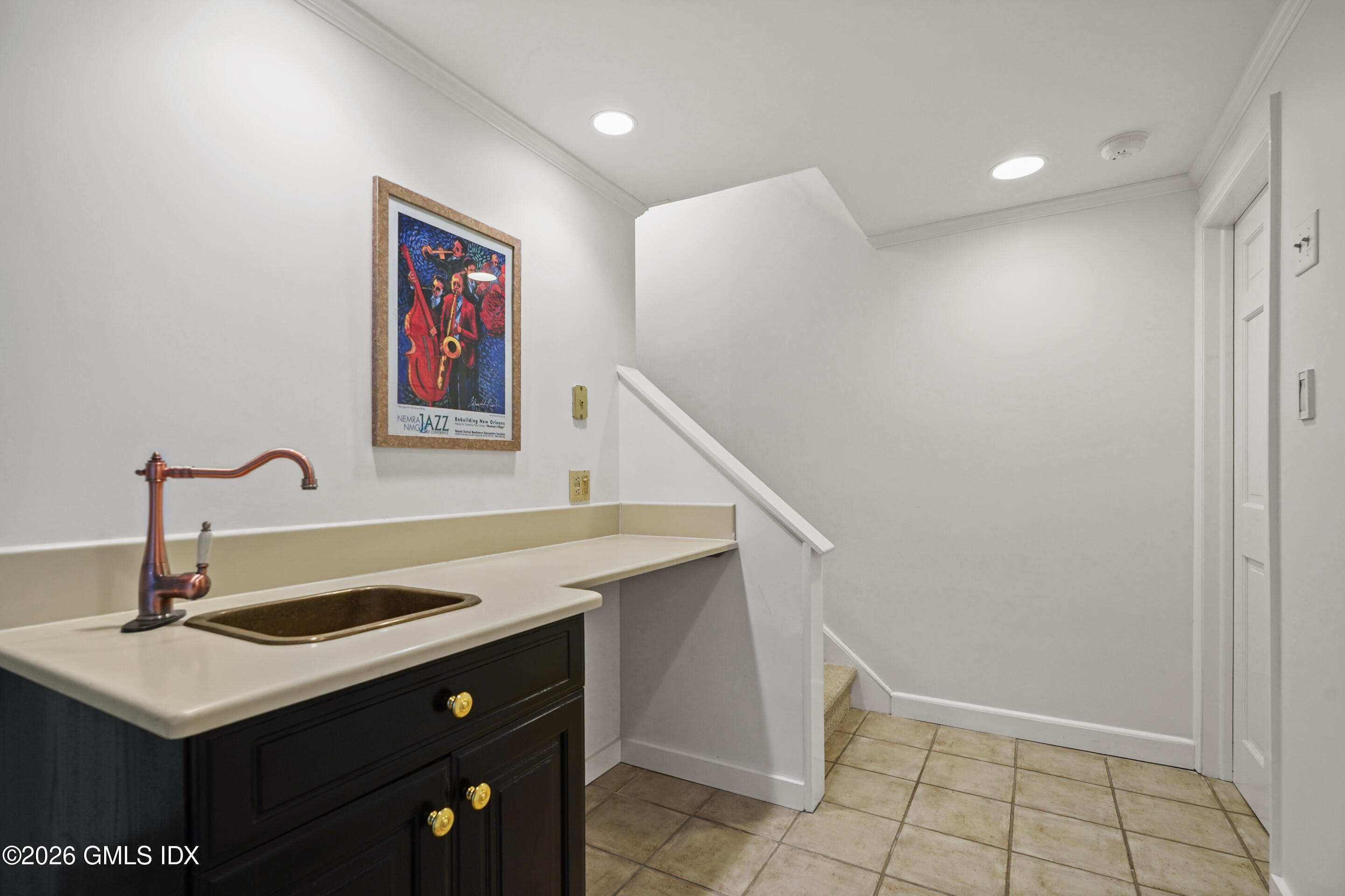 118 Butternut Hollow Road Greenwich, CT 06830 - Photo 34 of 44 a bathroom with a sink and a mirror