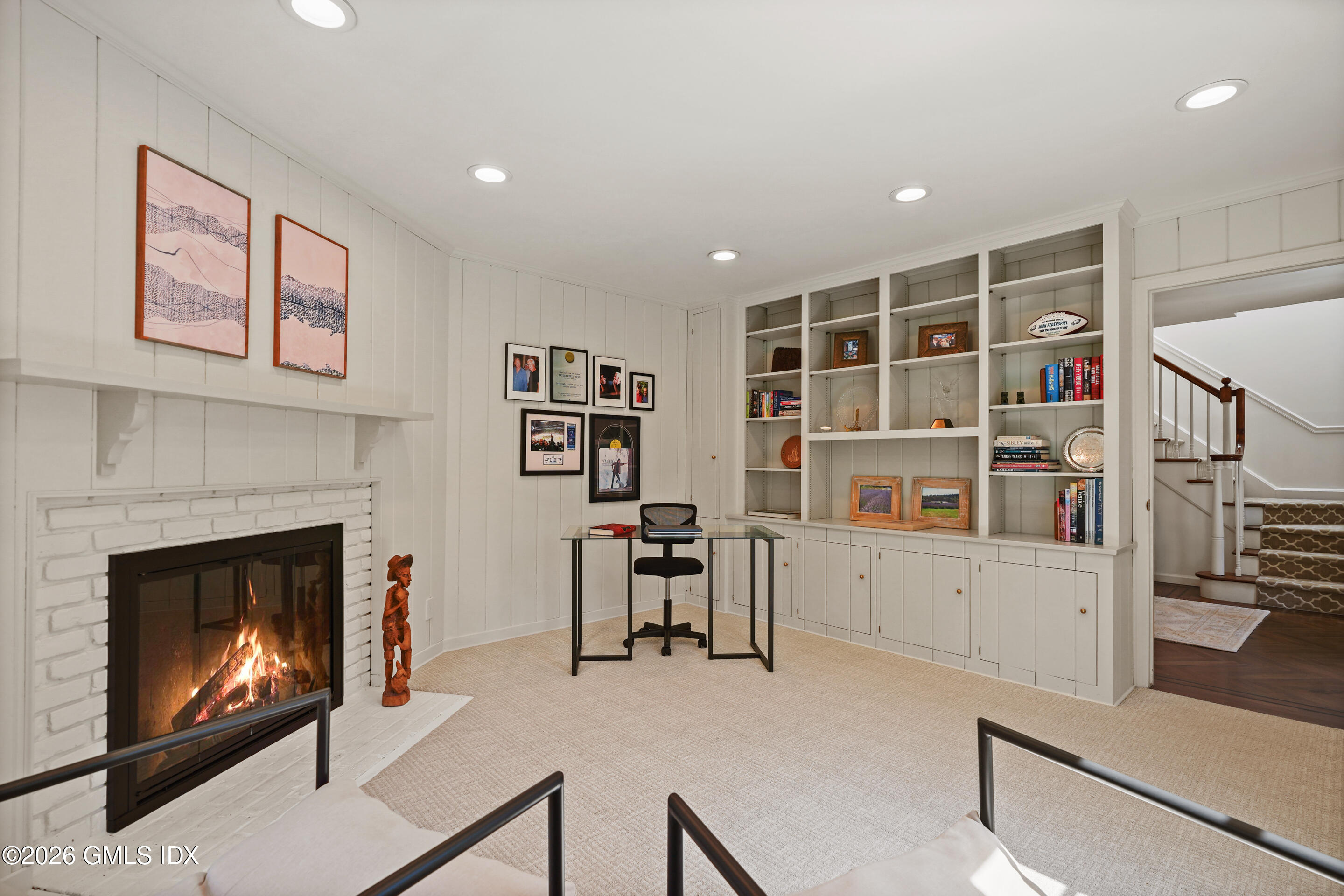 118 Butternut Hollow Road Greenwich, CT 06830 - Photo 7 of 44 a living room with furniture and a fireplace