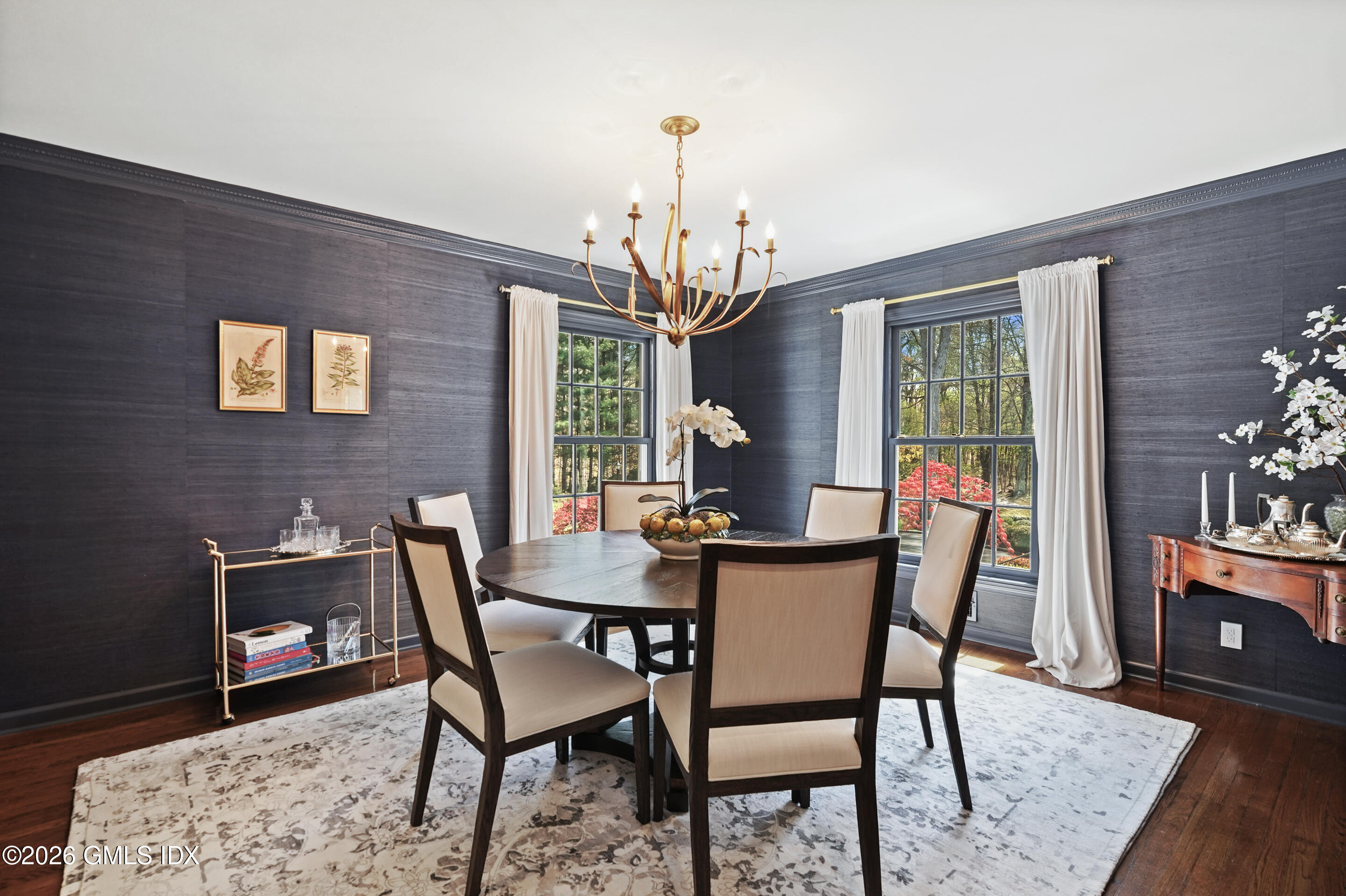 118 Butternut Hollow Road Greenwich, CT 06830 - Photo 10 of 44 a view of a dining room with furniture window and wooden floor