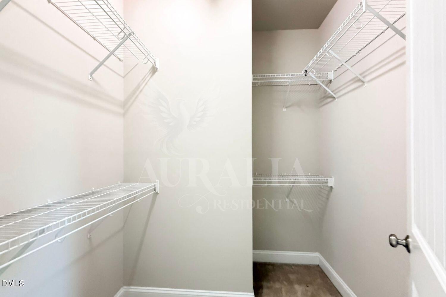 7754 ACC Boulevard Raleigh, NC 27617 - Photo 33 of 41 a view of small space with racks on the wall