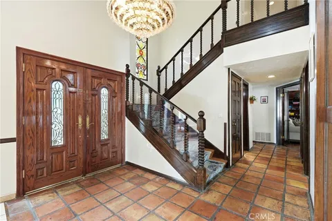 a view of an entryway with staircase