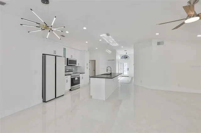 a view of a room with an empty space