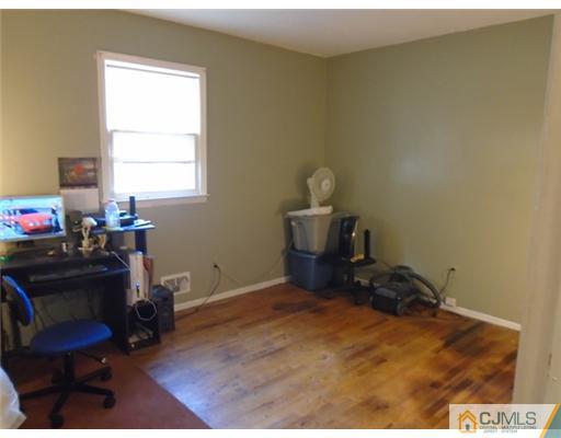 25 Hilltop Road Edison, NJ 08820 - Photo 11 of 21 a workspace with furniture and window