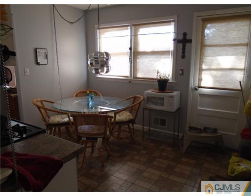 25 Hilltop Road Edison, NJ 08820 - Photo 5 of 21 a dining room with furniture and window