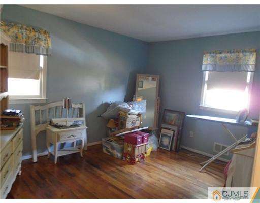 25 Hilltop Road Edison, NJ 08820 - Photo 10 of 21 a workspace with furniture and window