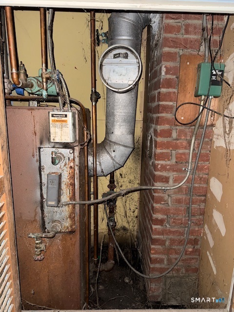 39 Pleasant View Avenue Windham, CT 06226 - Photo 14 of 21 a close view of water heater room