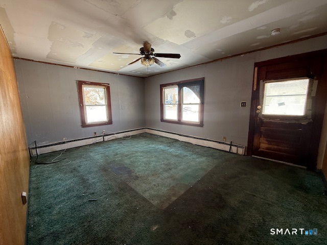 39 Pleasant View Avenue Windham, CT 06226 - Photo 8 of 21 en empty room with windows and ceiling fan