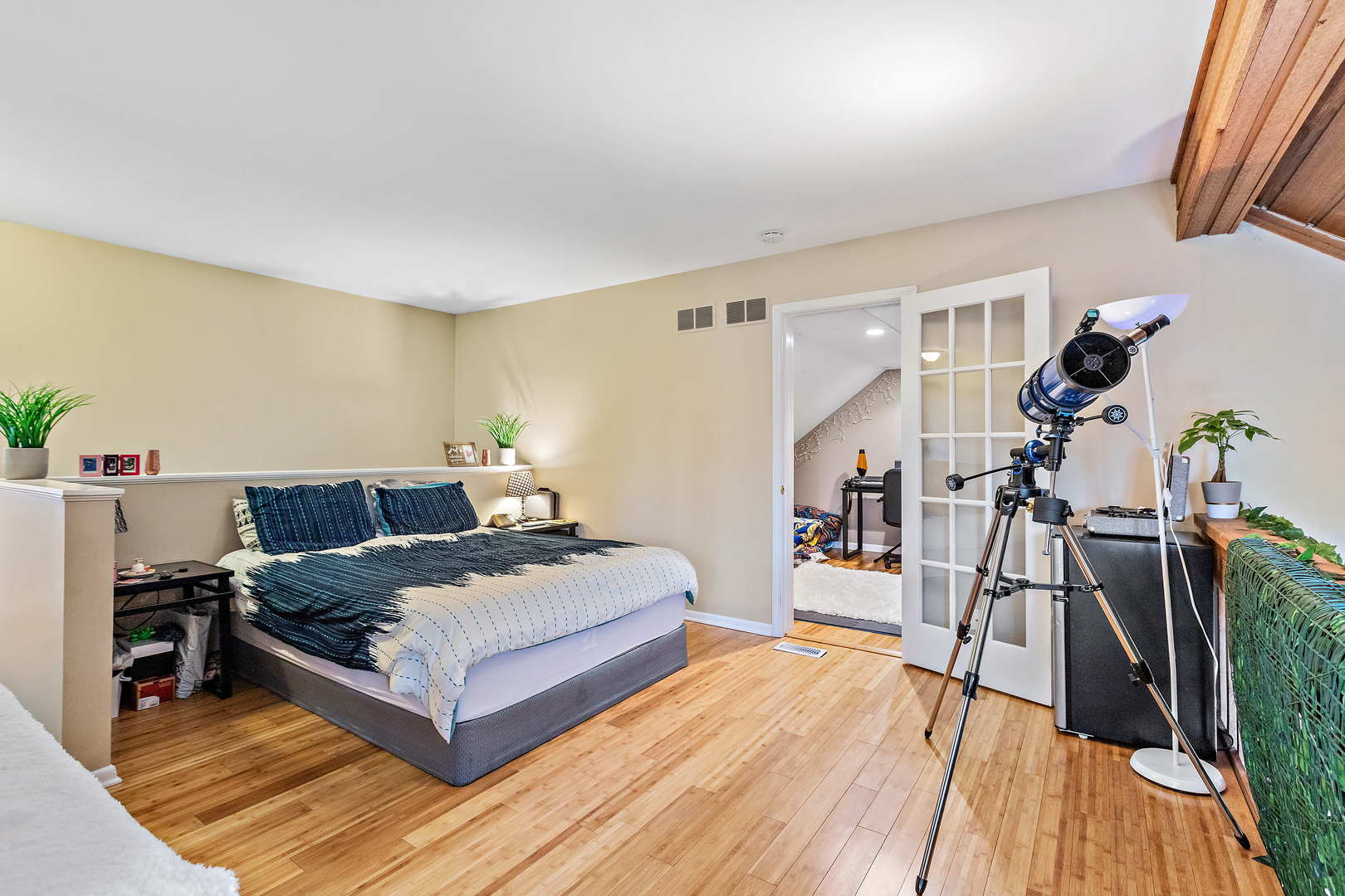 772 Chandler Road, Unit 772 Gurnee, IL 60031 - Photo 14 of 30 a bedroom with a bed and wooden floor