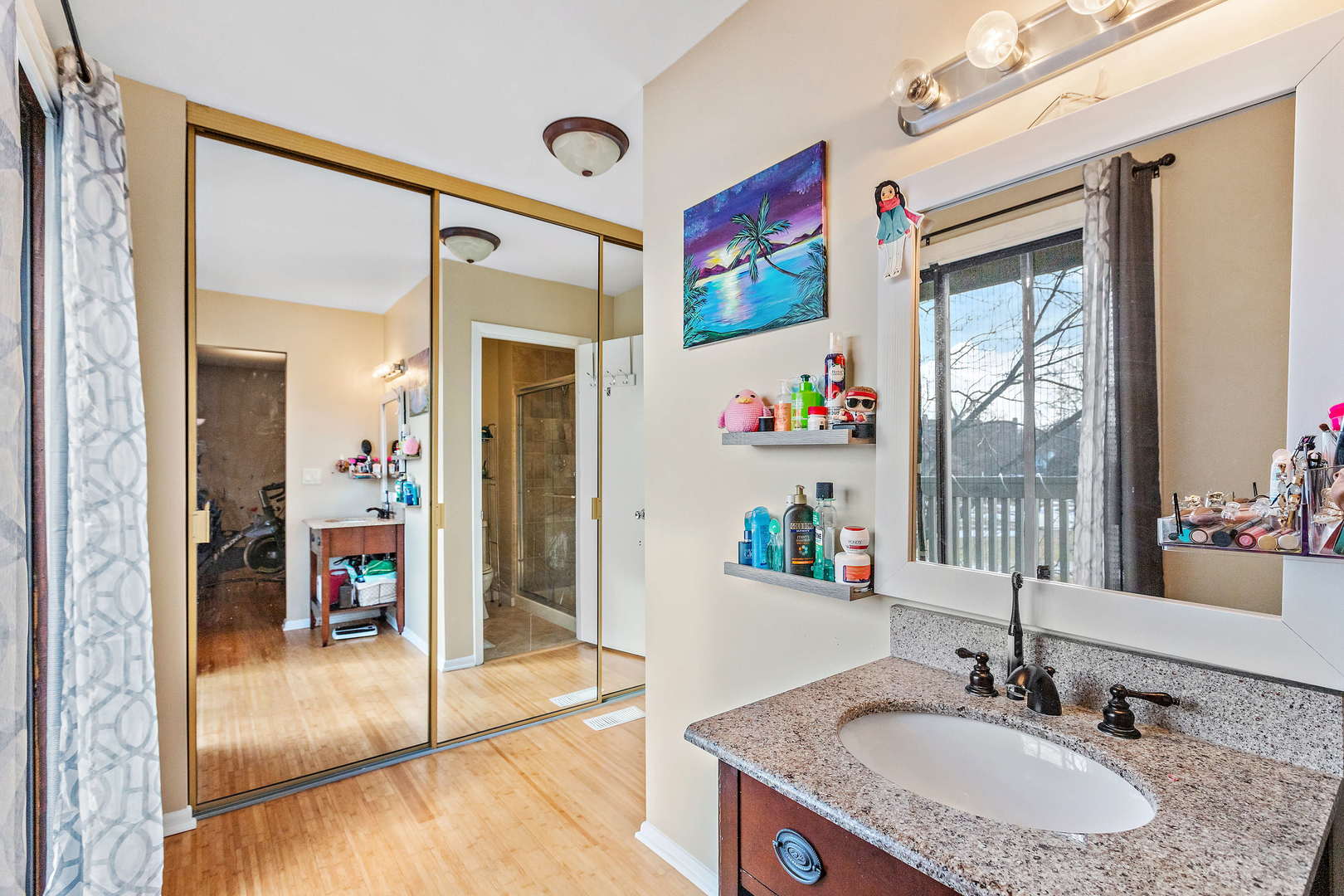 772 Chandler Road, Unit 772 Gurnee, IL 60031 - Photo 16 of 30 a bathroom with a sink double vanity and a mirror