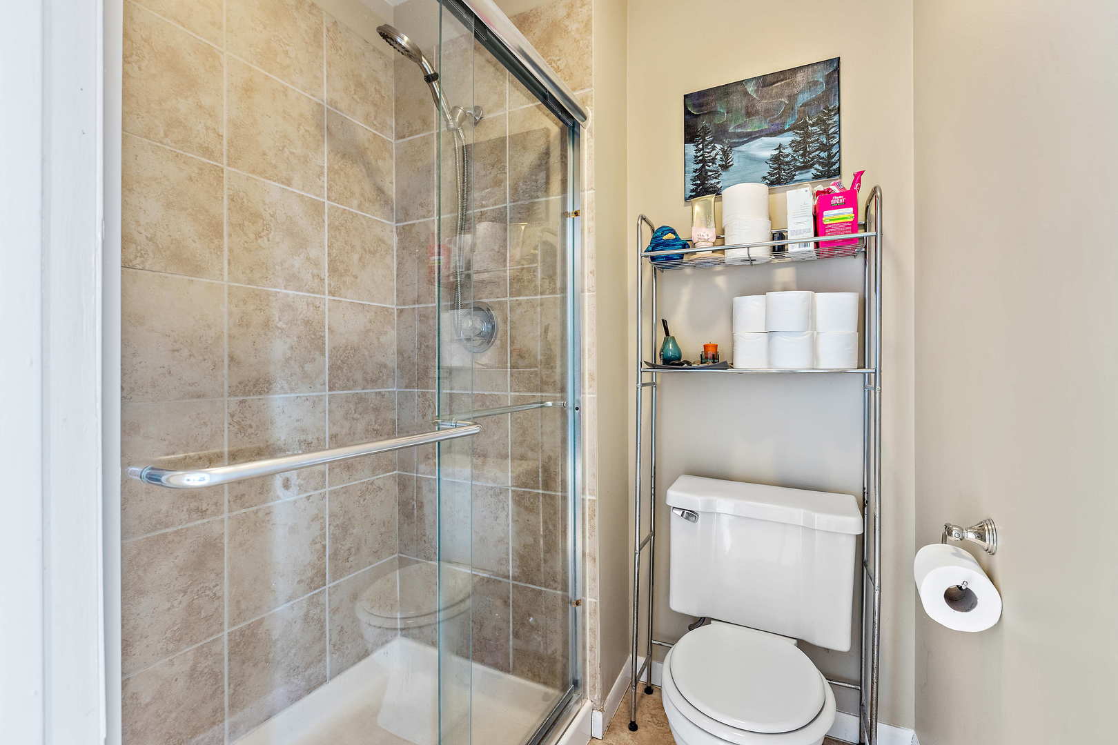 772 Chandler Road, Unit 772 Gurnee, IL 60031 - Photo 19 of 30 a bathroom with a toilet and a shower