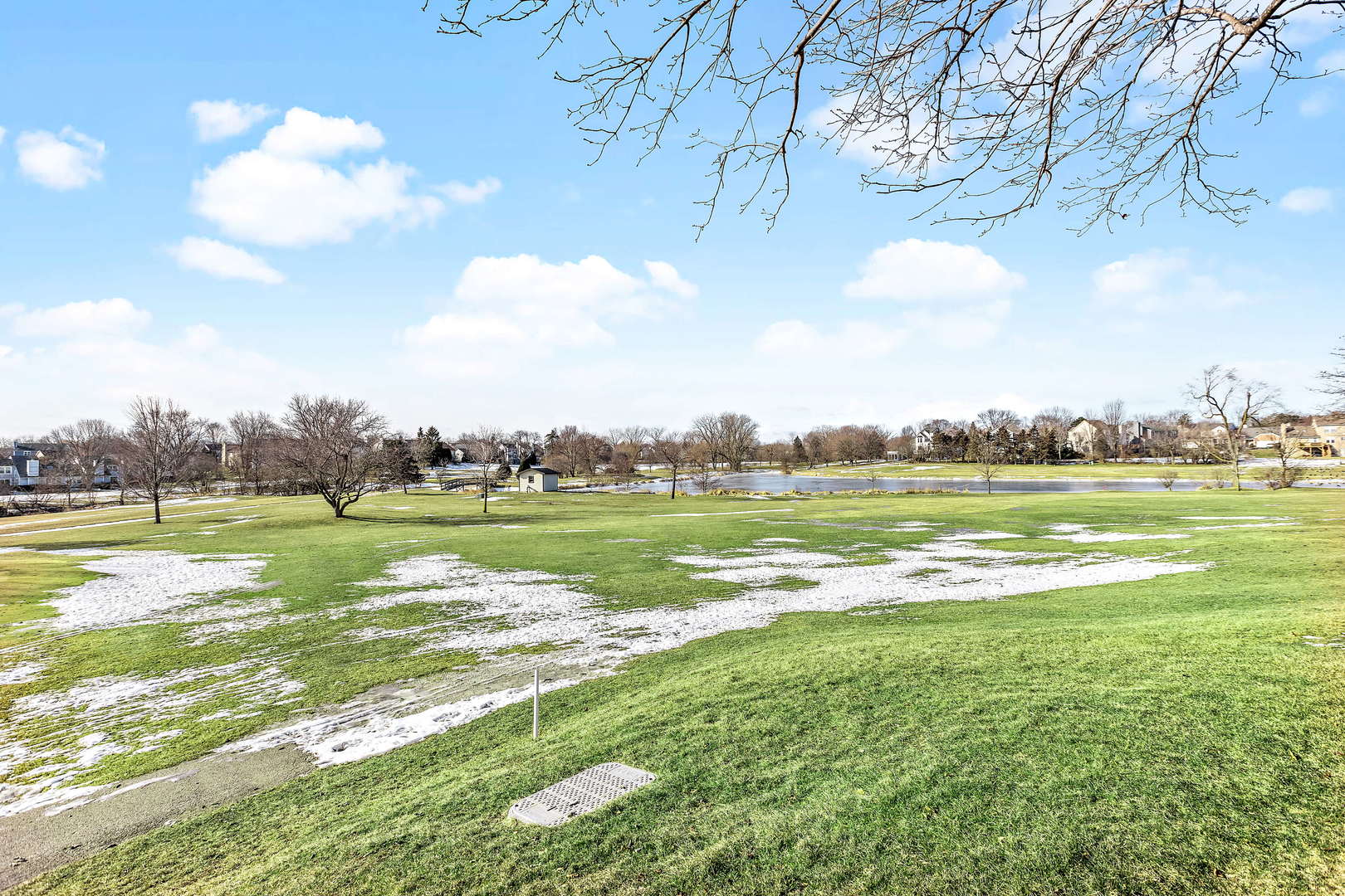 772 Chandler Road, Unit 772 Gurnee, IL 60031 - Photo 24 of 30 a view of a water fountain and a big yard