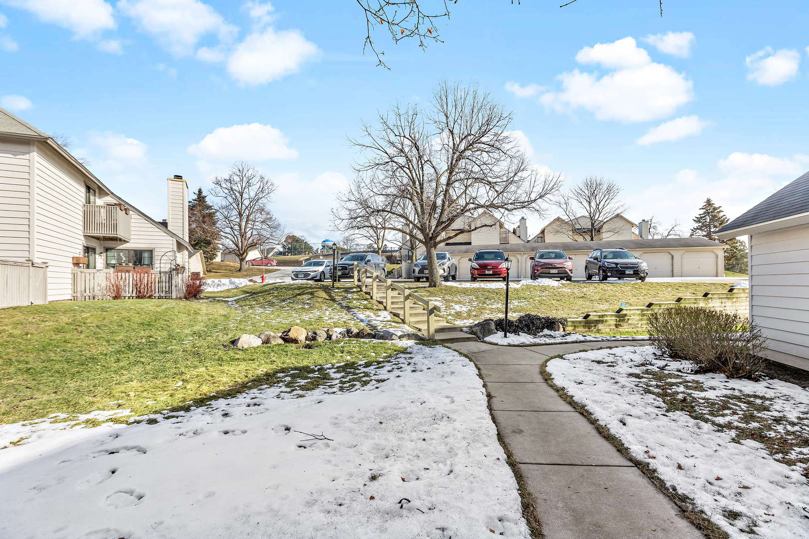 772 Chandler Road, Unit 772 Gurnee, IL 60031 - Photo 26 of 30 a view of a street with a building in the background