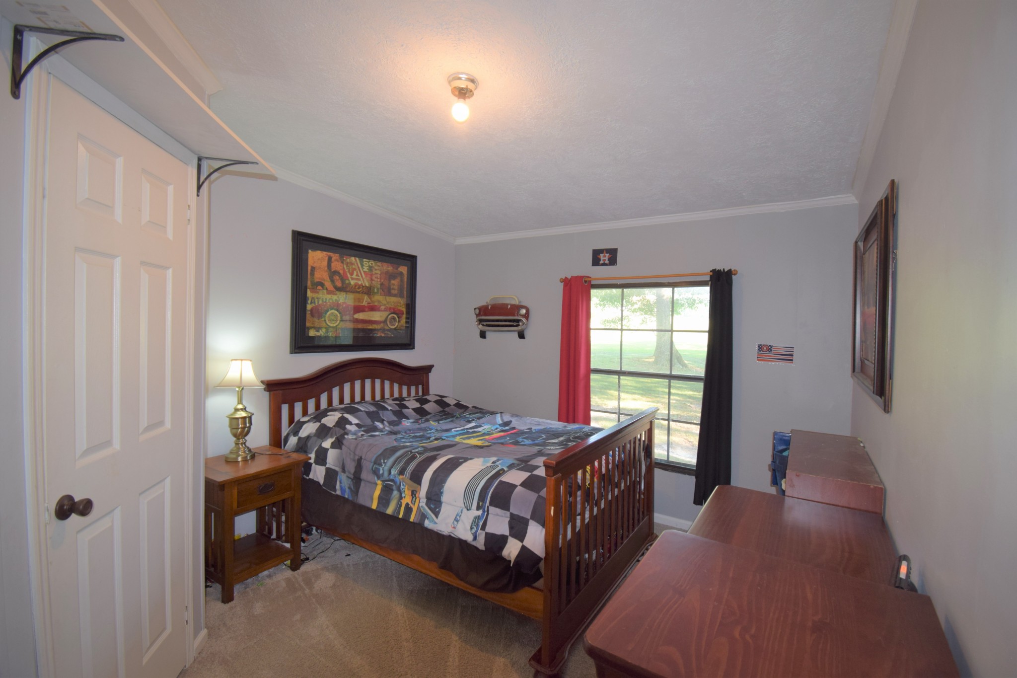 279 Hester Road Portland, TN 37148 - Photo 22 of 38 a bedroom with a bed and window